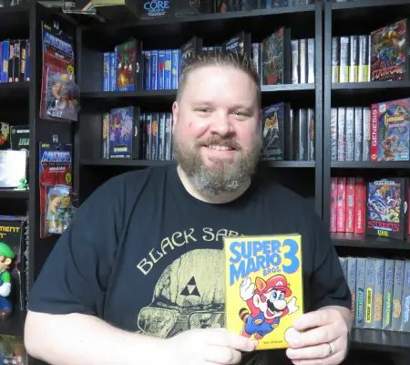 Me with my copy of Super Mario Bros 23- one of my best NES games of all time